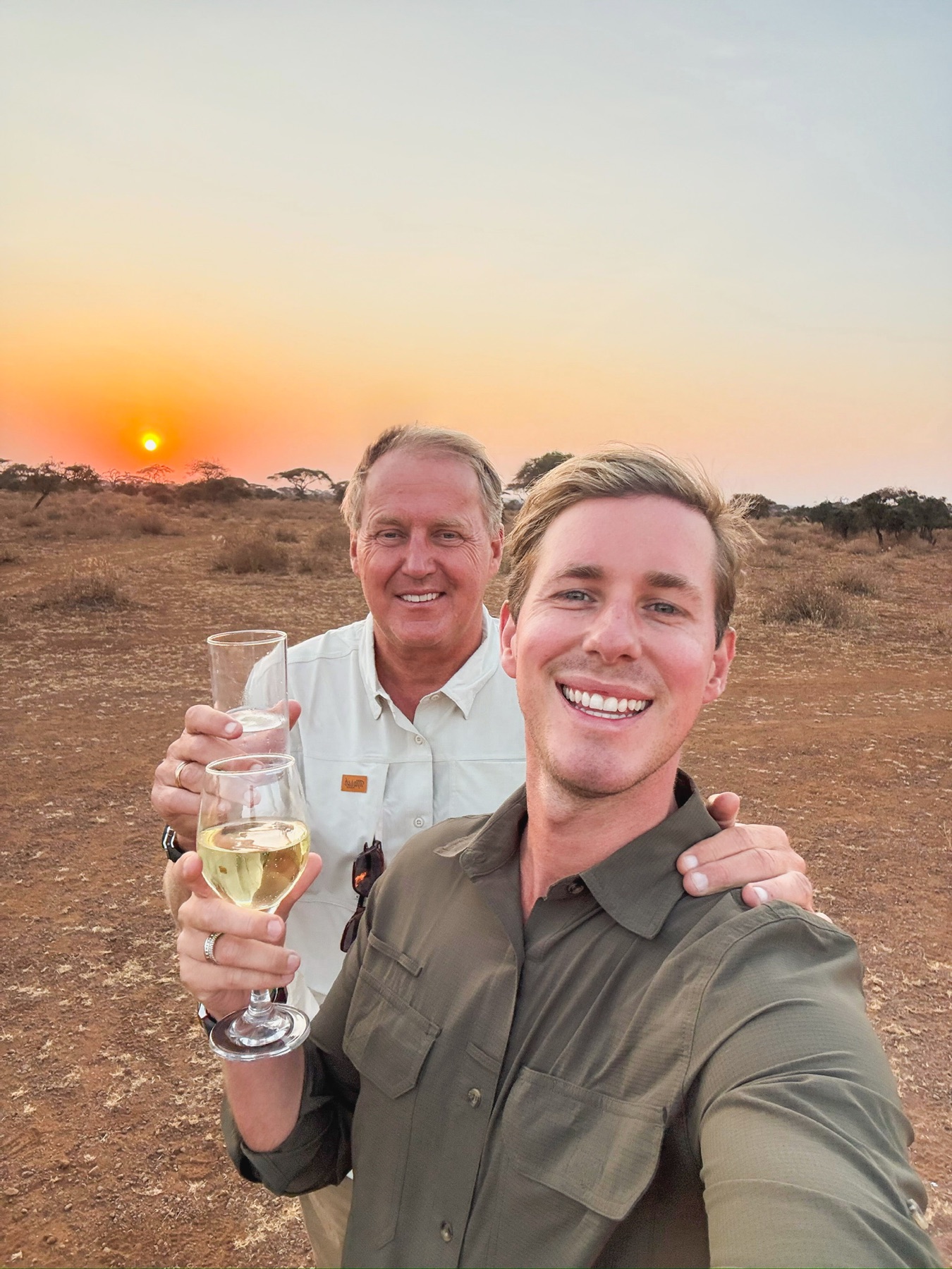 Thibault Cannon and Billy celebrating sunset together during their travels